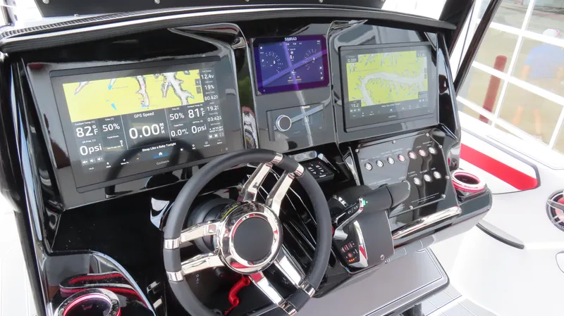 Slide: The Image of 2025 Sunsation 32 CCX dashboard with advanced navigation and control systems. - 5