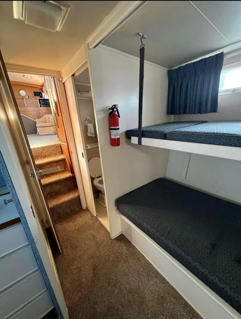 Slide: The Image of guest berth w/ convertible settee - 29