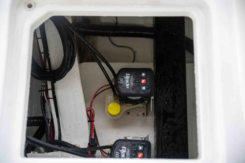 Slide: The Image of 2024 Contender 26 Bay boat wiring and battery compartment. - 33