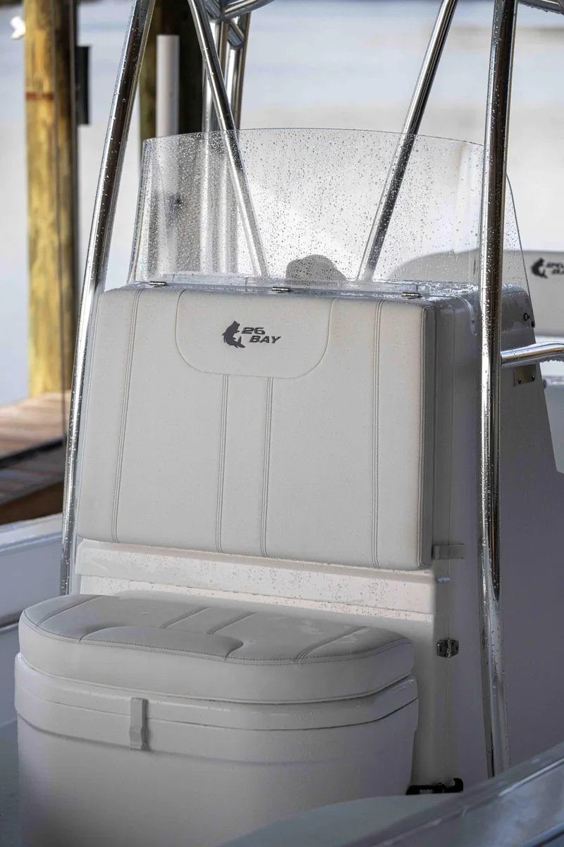 Slide: The Image of 2024 Contender 26 Bay boat console with cushioned seating and sleek design. - 4