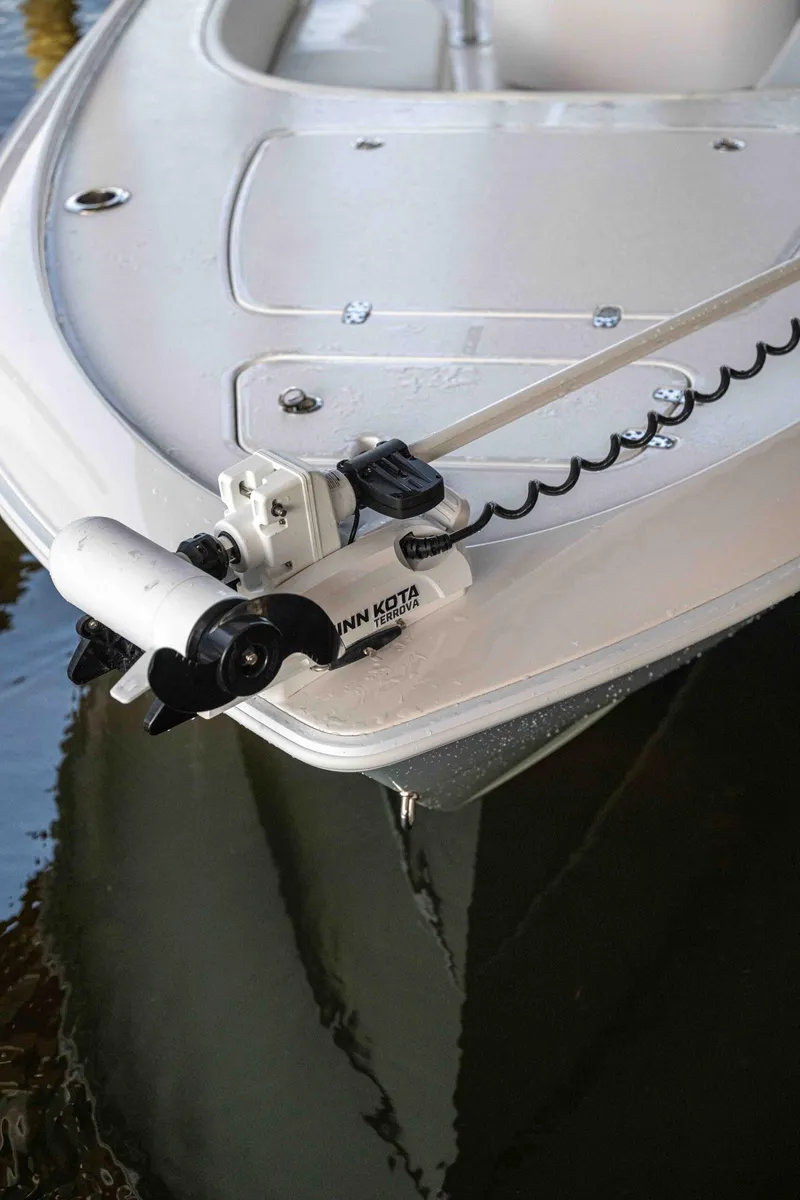 Slide: The Image of 2024 Contender 26 Bay boat with Minn Kota trolling motor on the bow. - 5