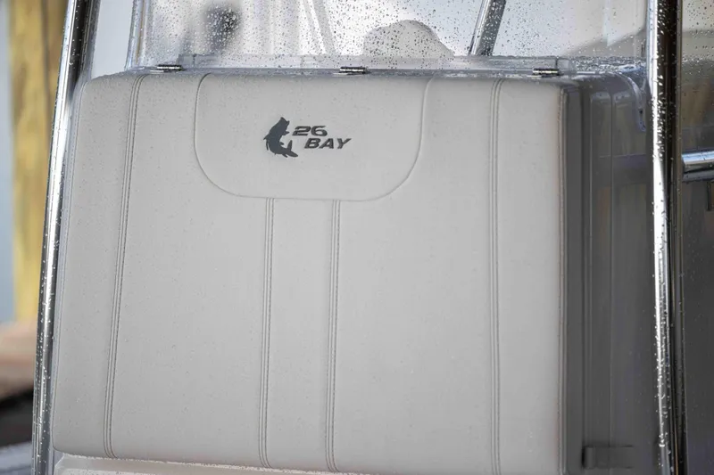 Slide: The Image of 2024 Contender 26 Bay boat seat with logo detail. - 8