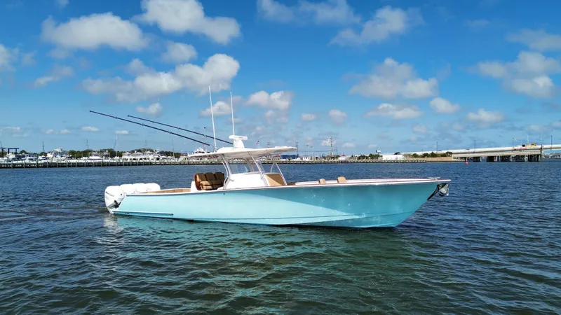 The Image of 2021 Valhalla Boatworks V-41 on calm water under blue sky. - 0
