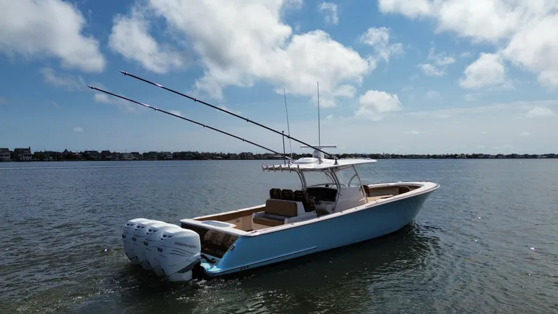 Slide: The Image of 2021 Valhalla Boatworks V-41 on calm water under a blue sky. - 10