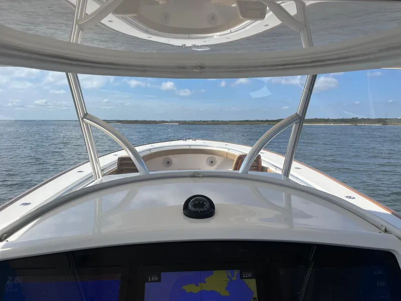 Slide: The Image of Valhalla Boatworks V-41, 2021 model, navigating open waters under a clear sky. - 16