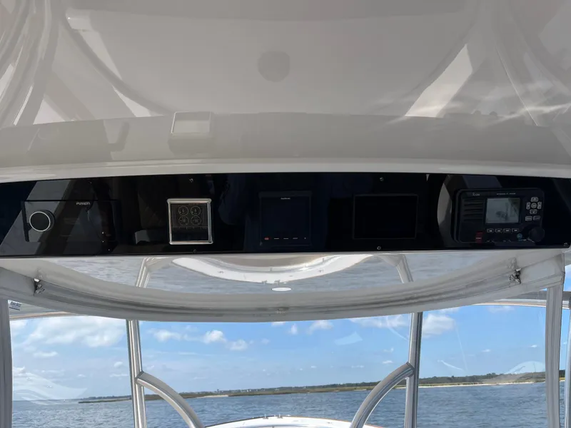 Slide: The Image of Valhalla Boatworks V-41 2021 dashboard with ocean view in background. - 17