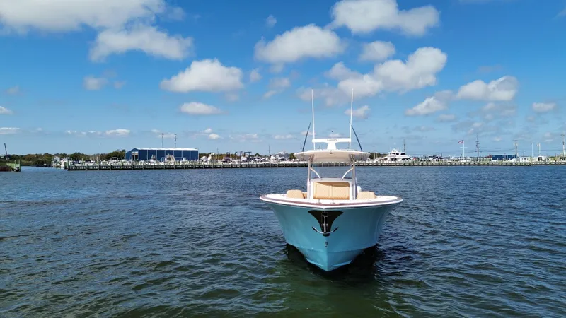 Slide: The Image of 2021 Valhalla Boatworks V-41 on calm water under blue sky. - 2