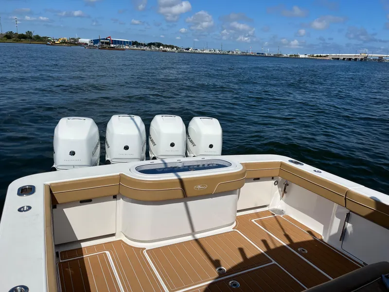 Slide: The Image of 2021 Valhalla Boatworks V-41 with four engines on open water. - 21