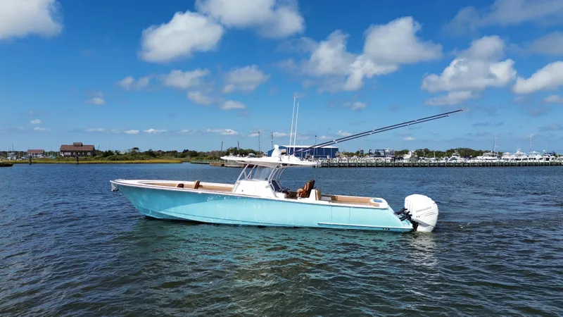 Slide: The Image of 2021 Valhalla Boatworks V-41 on calm water under blue sky. - 7