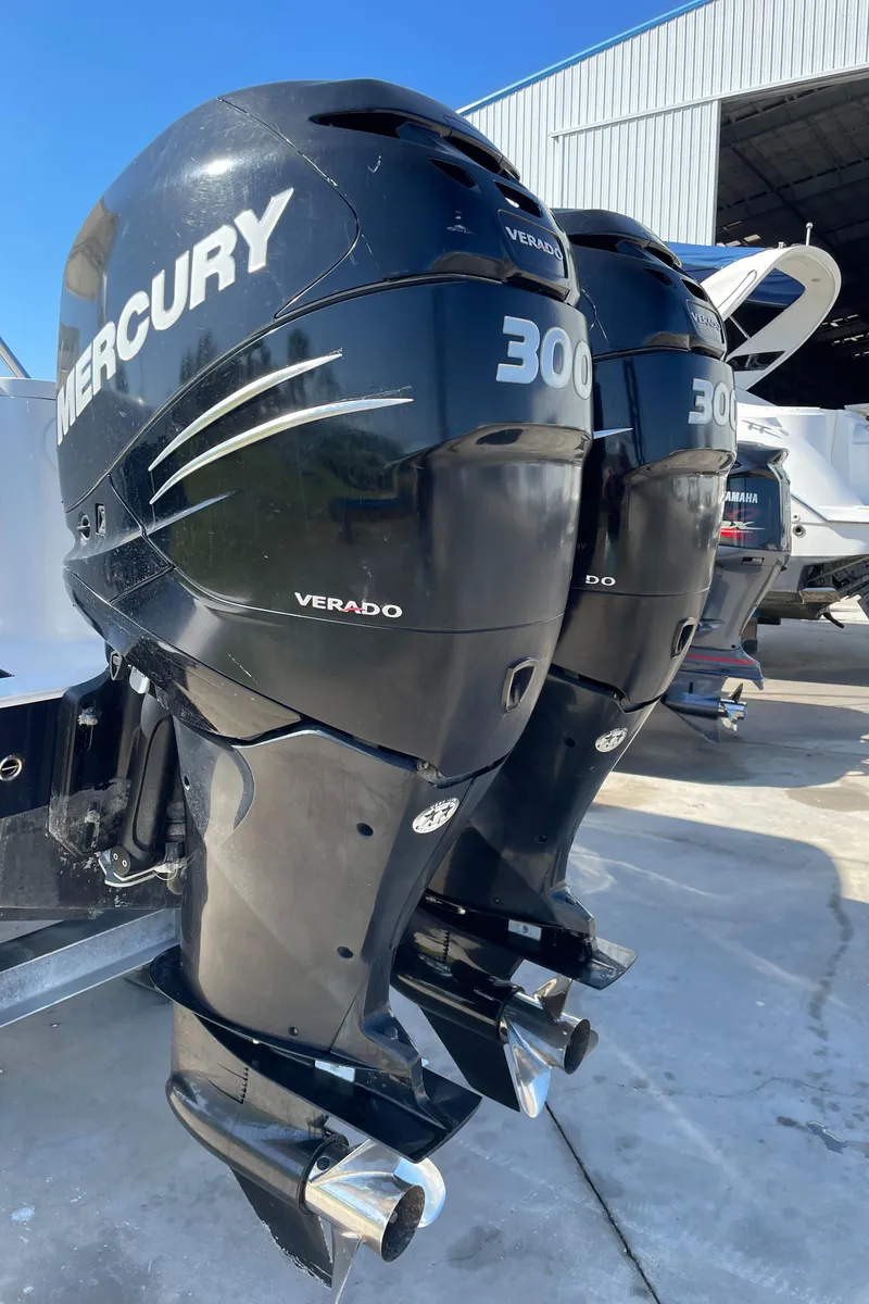 Slide: The Image of Twin Mercury Verado 300 engines on a 2008 Intrepid 323 Cuddy boat. - 11