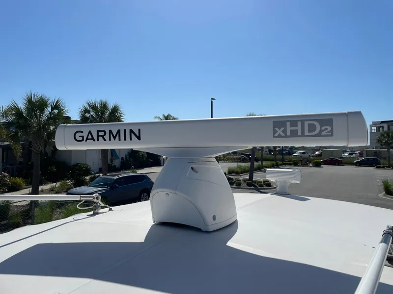 Slide: The Image of Garmin xHD2 radar on 2008 Intrepid 323 Cuddy boat, clear sky background. - 41