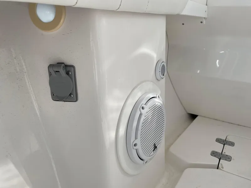 Slide: The Image of 2008 Intrepid 323 Cuddy interior with speaker and electrical outlet. - 47