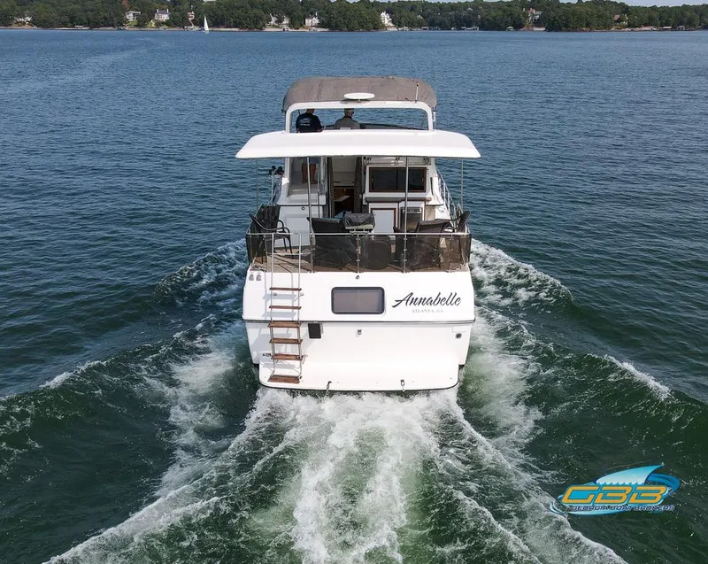 Slide: The Image of 1989 Carver 3807 Aft Cabin yacht "Annabelle" cruising on a lake. - 14