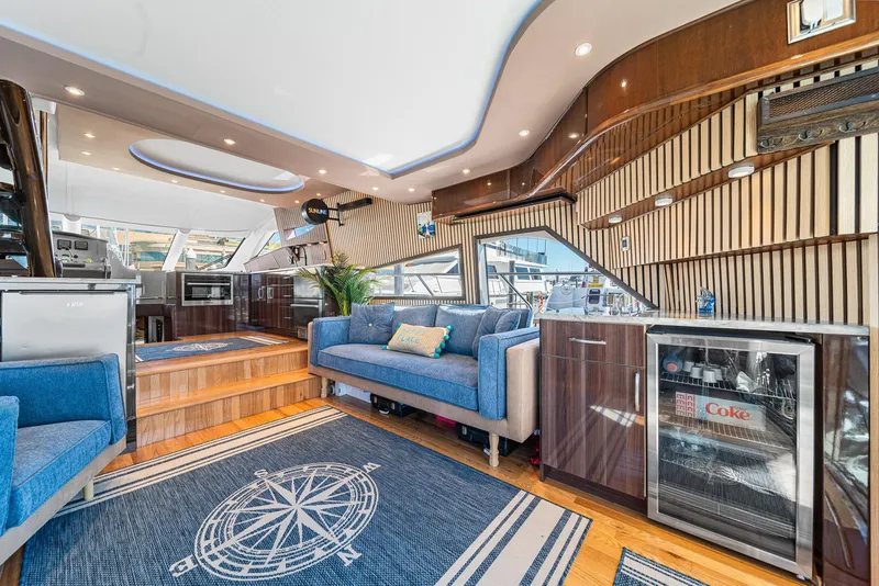 Slide: The Image of Luxurious interior of a 2007 Marquis 55 LS yacht with modern furnishings and elegant design. - 7