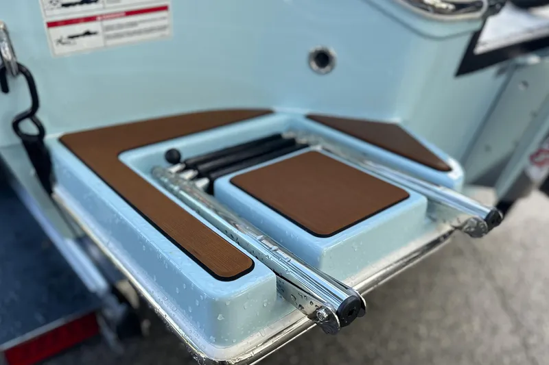 Slide: The Image of 2026 Pathfinder 2500 Hybrid boat swim platform with retractable ladder and non-slip surface. - 19