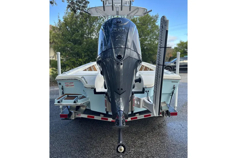 Slide: The Image of 2026 Pathfinder 2500 Hybrid boat rear view with powerful outboard motor. - 20