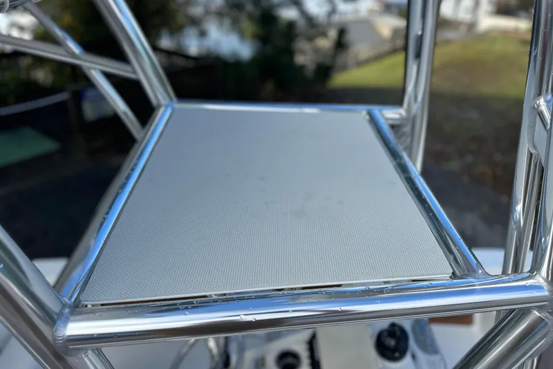 Slide: The Image of Close-up of 2026 Pathfinder 2500 Hybrid boat's metal frame and platform. - 22