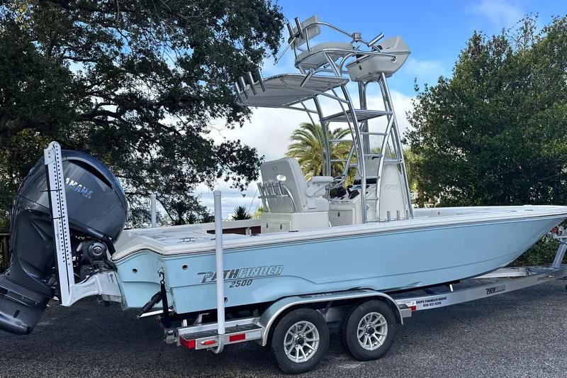 Slide: The Image of 2026 Pathfinder 2500 Hybrid boat on trailer with Yamaha outboard motor. - 27