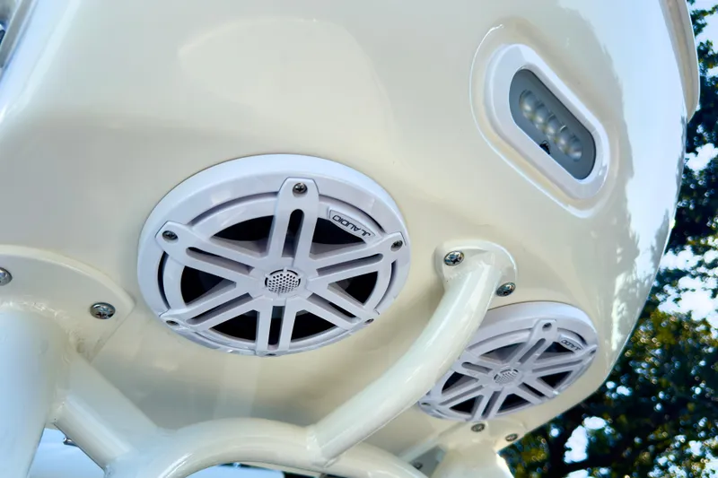 Slide: The Image of 2026 Pathfinder 2500 Hybrid boat seat with sleek design and stainless steel frame. - 7