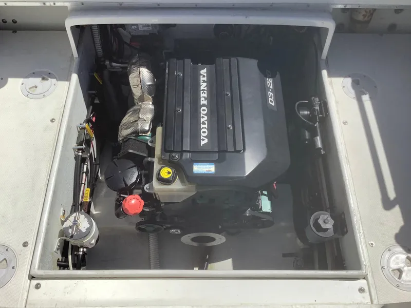 Slide: The Image of Volvo Penta engine in 2007 SeaSport Explorer 2400 boat, open engine compartment view. - 8