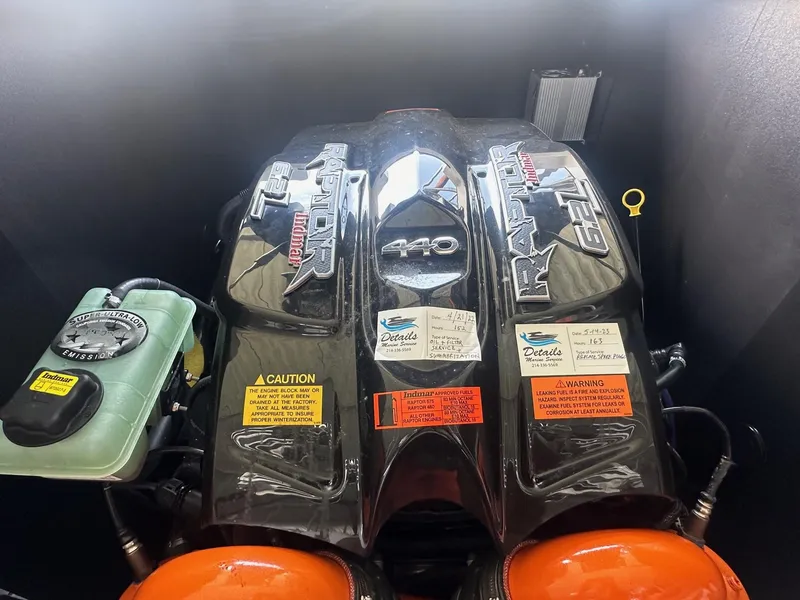 Slide: The Image of 2017 Tigé RZX3 engine compartment with Raptor 6.2L 410 horsepower engine. - 28