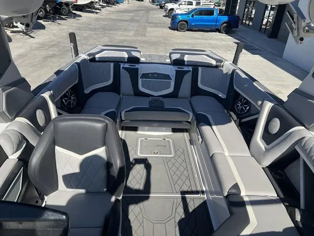 Slide: The Image of 2021 Tigé ZX Class 25 ZX boat interior with luxurious seating and modern design. - 10