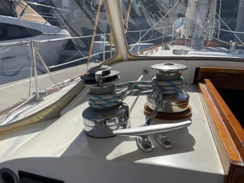 Slide: The Image of Winches on 1977 Hinckley Bermuda 40 MK III Sloop deck, with ropes and sunlight. - 15