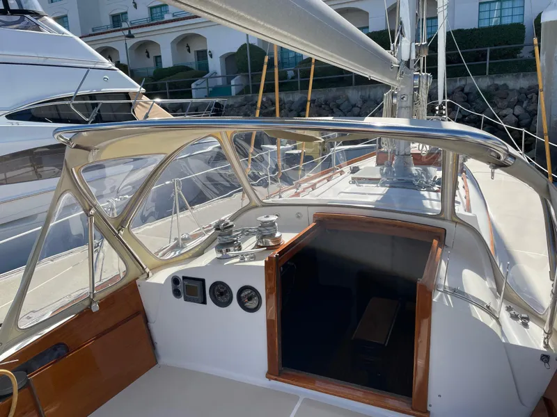 Slide: The Image of 1977 Hinckley Bermuda 40 MK III Sloop cockpit with open cabin and navigation instruments. - 28