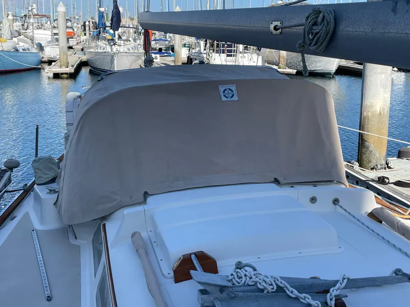 Slide: The Image of Hinckley Bermuda 40 MK III Sloop, 1977, docked at marina with covered cockpit. - 6