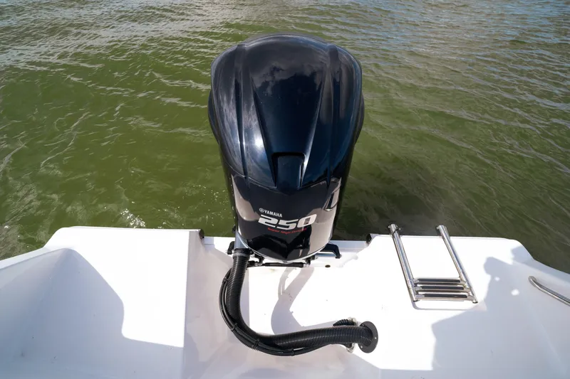 Slide: The Image of 2020 Sportsman Open 232 Center Console boat with Yamaha 250 outboard motor. - 11