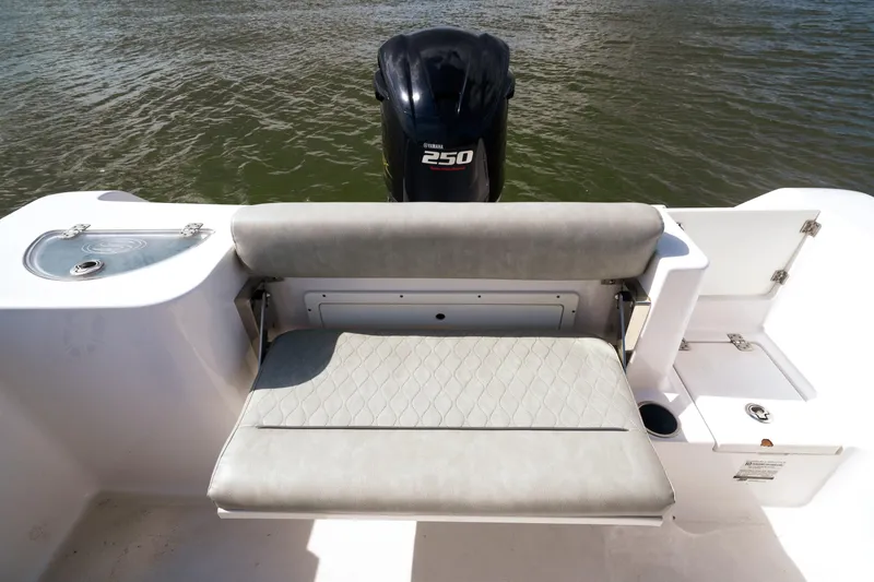 Slide: The Image of 2020 Sportsman Open 232 Center Console boat with Yamaha 250 engine, rear seating view. - 9