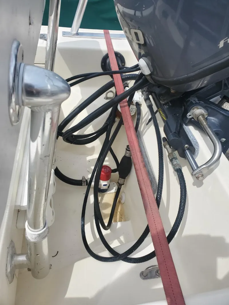 Slide: The Image of 2013 Rigid Boats 12 Sport engine and wiring details. - 7