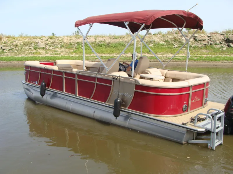 Slide: The Image of 2019 Bentley Pontoons 253 Admiral Elite, red pontoon boat with canopy on calm water. - 12