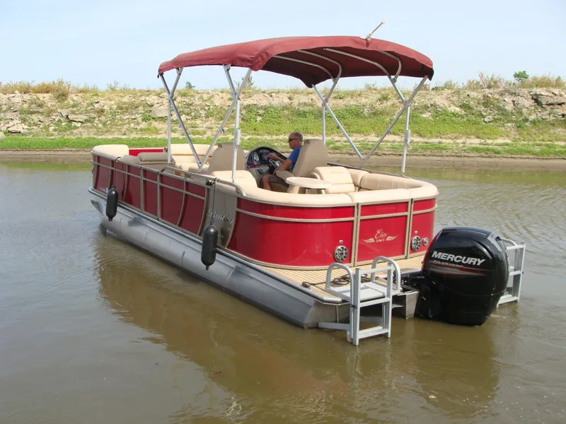 Slide: The Image of 2019 Bentley Pontoons 253 Admiral Elite on water, red canopy, Mercury engine. - 13