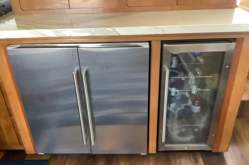 Slide: The Image of Kitchen area of the 1999 Carver 530 Voyager Pilothouse yacht. - 5