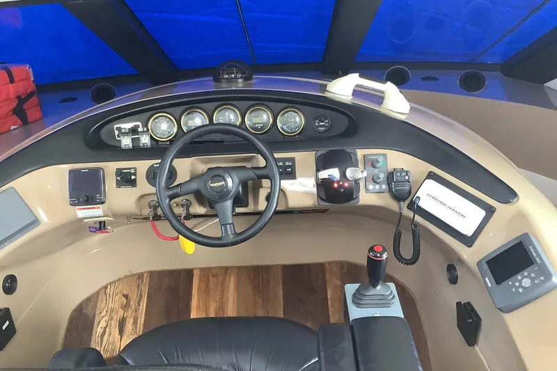 Slide: The Image of Interior view of 1999 Carver 530 Voyager Pilothouse cockpit. - 11