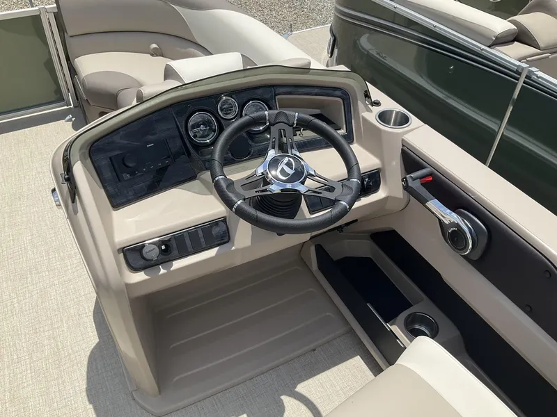 Slide: The Image of 2024 Tahoe Pontoon LTZ boat steering console with versatile rear lounger. - 10