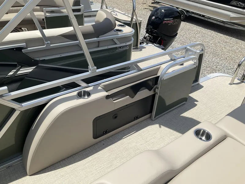 Slide: The Image of 2024 Tahoe Pontoon LTZ boat with versatile rear lounger and Mercury Pro XS engine. - 13