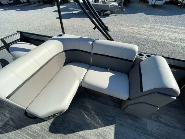 Slide: The Image of 2023 Qwest Pontoons E-Class XRE Cruise 822 LT interior seating with gray upholstery. - 13
