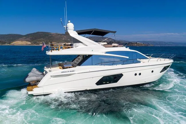 Slide: The Image of Luxury Absolute Fly yacht cruising in open sea, 2015 model, showcasing sleek design and fractional ownership. - 0