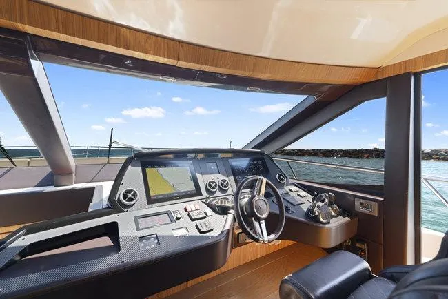 Slide: The Image of Luxurious 2015 Absolute Fly yacht helm with modern navigation controls and ocean view. - 28