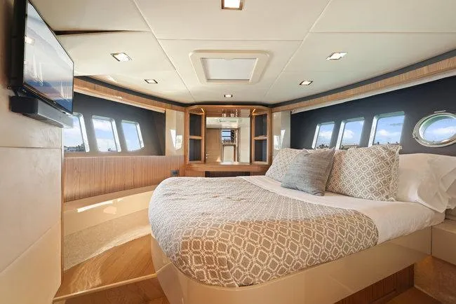 Slide: The Image of Luxurious yacht bedroom interior with elegant bedding and panoramic windows, Absolute Fly 2015 model. - 33