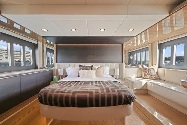 Slide: The Image of Luxurious yacht bedroom interior with modern design, featuring large windows and elegant furnishings. - 39