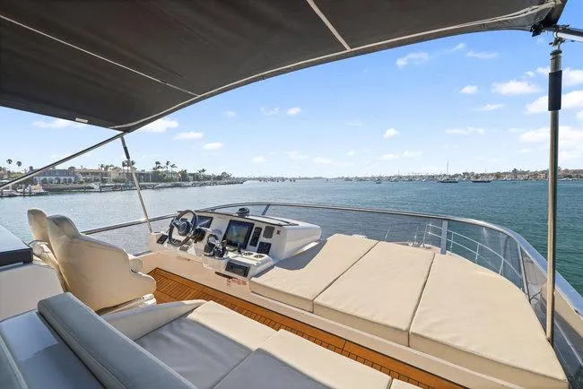 Slide: The Image of Luxurious 2015 Absolute Fly yacht with spacious deck, offering stunning ocean views. - 8
