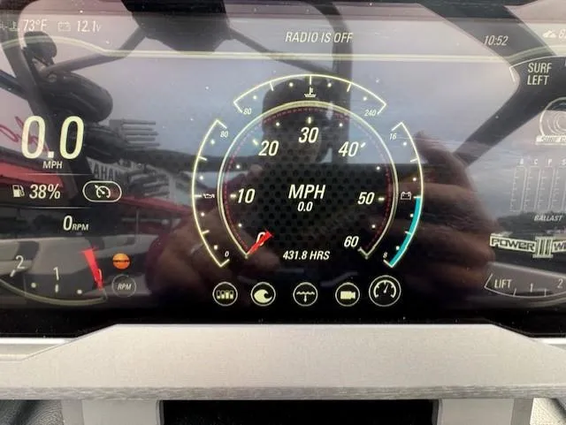Slide: The Image of Dashboard of a 2021 Malibu M240 boat showing speedometer and various gauges. - 21