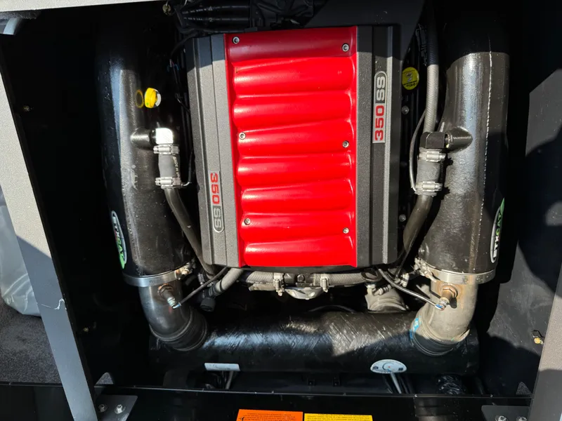 Slide: The Image of 2013 Malibu WVLX engine with red cover labeled "350 SS." - 10