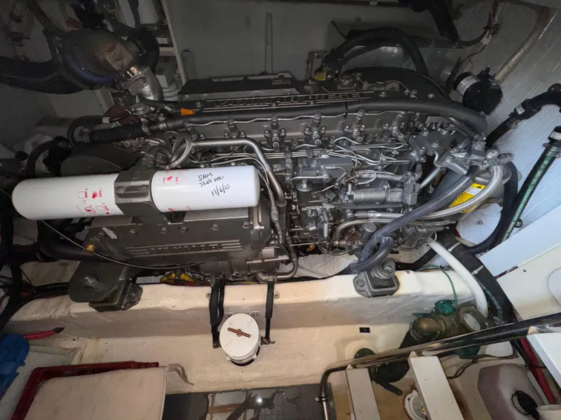 Slide: The Image of Engine of a 2005 Sabre 38 boat, detailed view in engine compartment. - 28