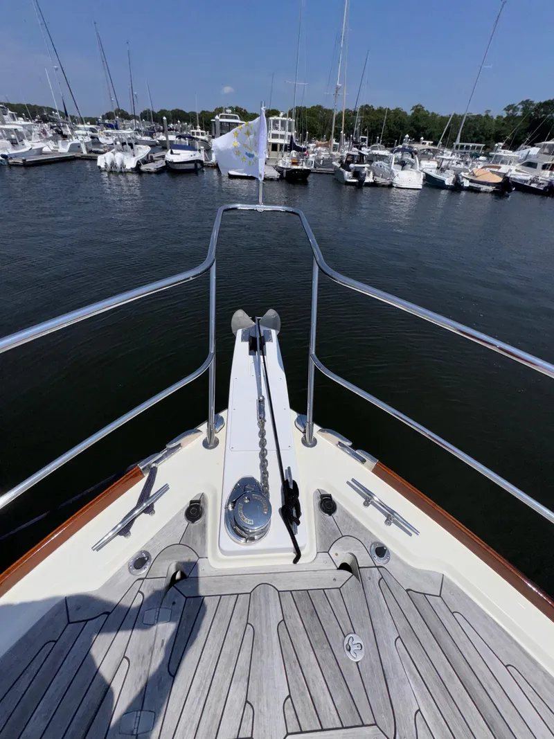 Slide: The Image of Bow view of 2005 Sabre 38 yacht docked in a marina. - 32