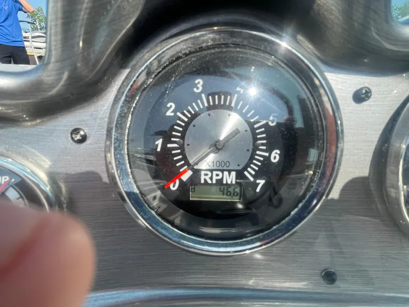 Slide: The Image of Tachometer of 2021 NauticStar 223 DC Deck boat showing RPM reading. - 14