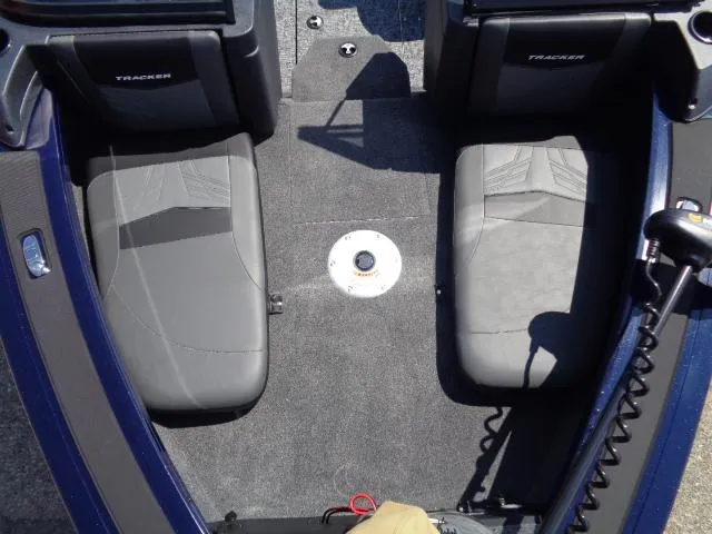 Slide: The Image of 2025 Tracker Targa V-18 Combo boat interior with two gray seats. - 12